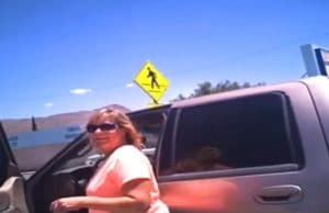 Officer Shuts Woman in Her Hot Car for Leaving Her Dog in the Car Woman gets a fine and scolding from officer for leaving her dog in a hot car