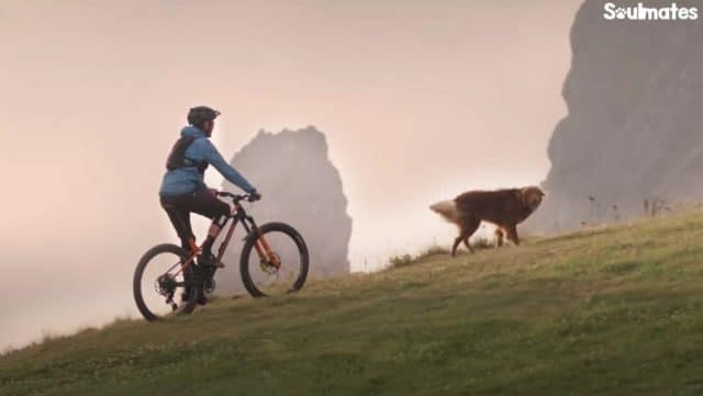 Mountain biking with his best friend