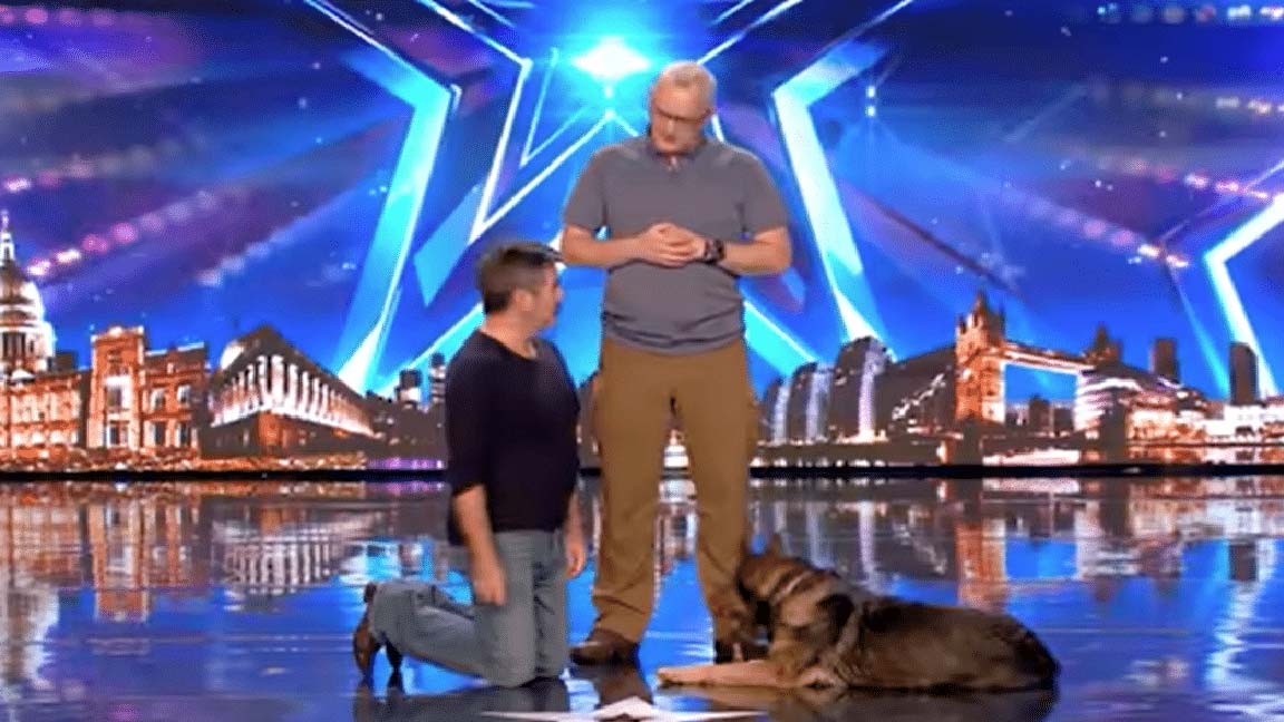 This well trained police dog performs a magic act on TV