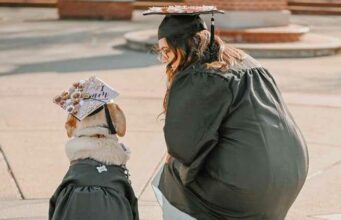 Veteran And Sexual Assault Survivor Earns Her Degree With The Help Of Her Service Dog Soldier with PTSD graduates college thanks to her service dog